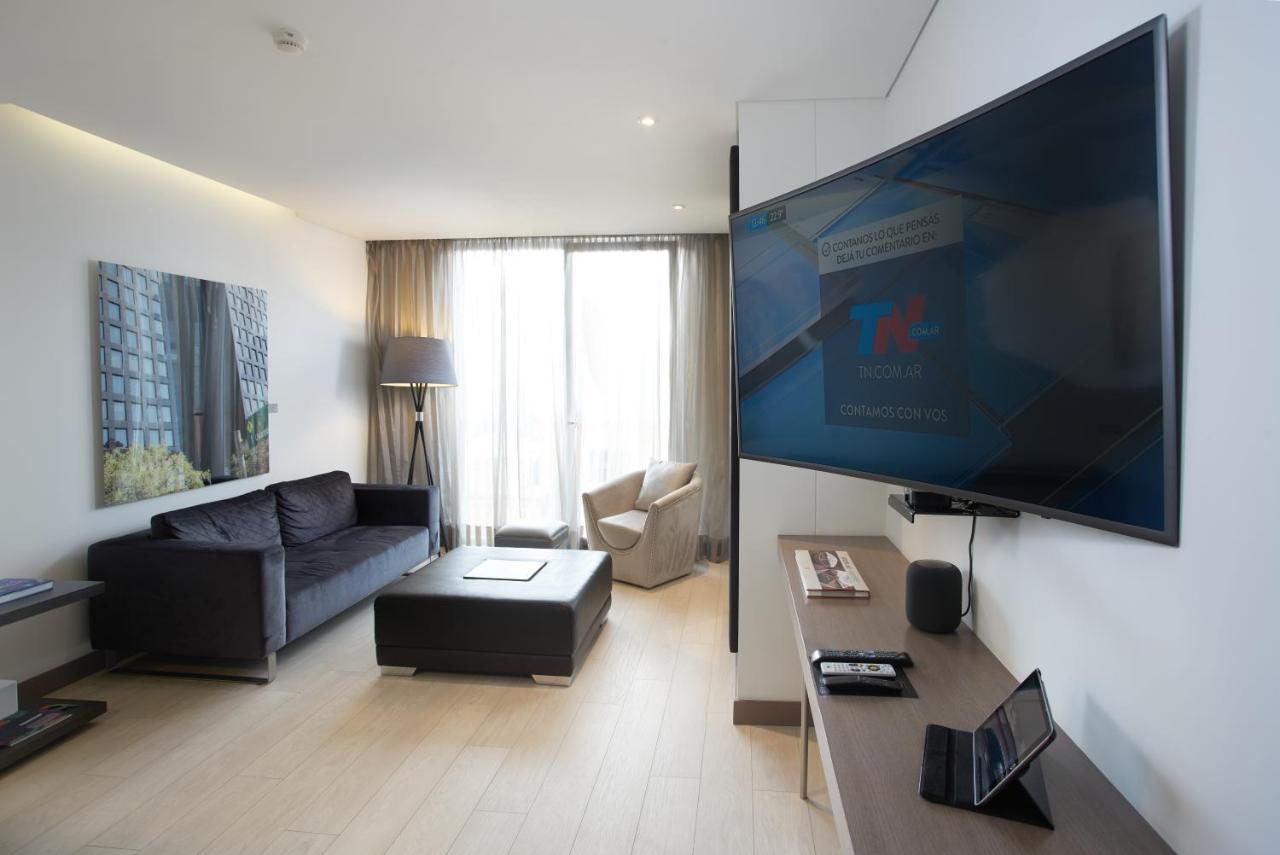 Hotel 100 Luxury Suites By Preferred Bogotá Exteriér fotografie A television set in a hotel room